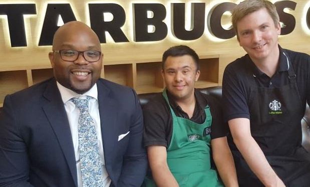 Bilal Mial from Fulham with his manager at Starbucks Westfield